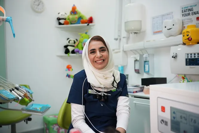Dentist understanding a child’s dental needs with parent involvement